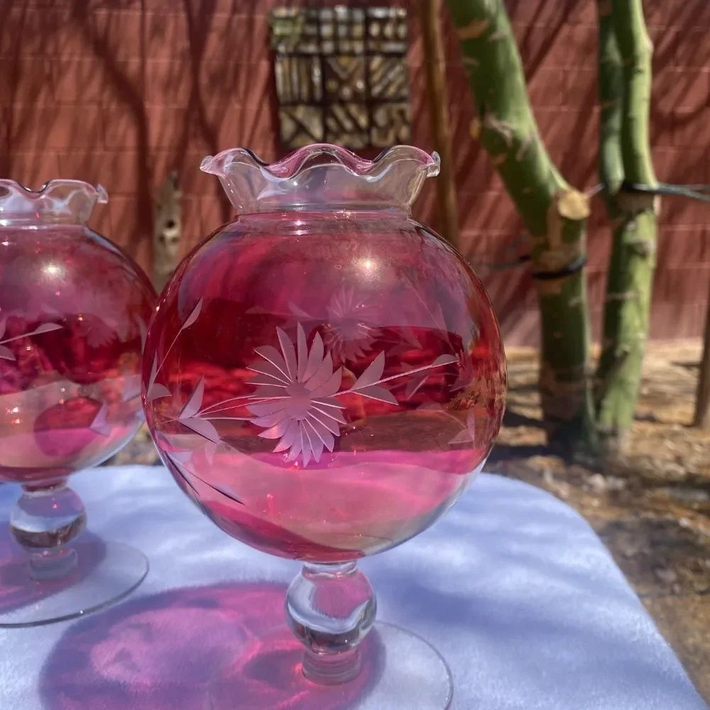 2 Vtg  cranberry round vases 2 w/etched flowers on a base. 50s 60s